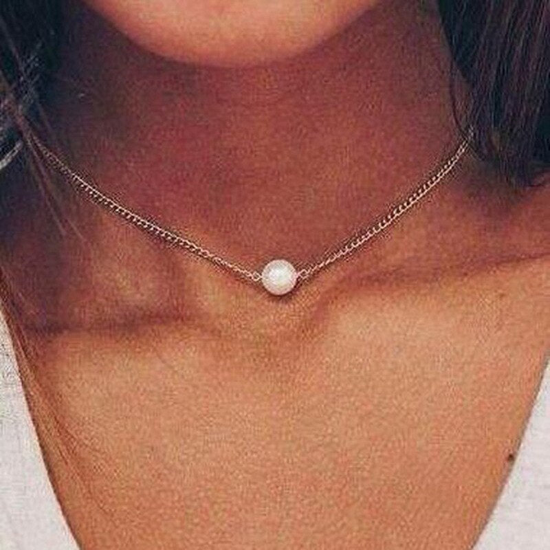 Collar con corazón de mujer