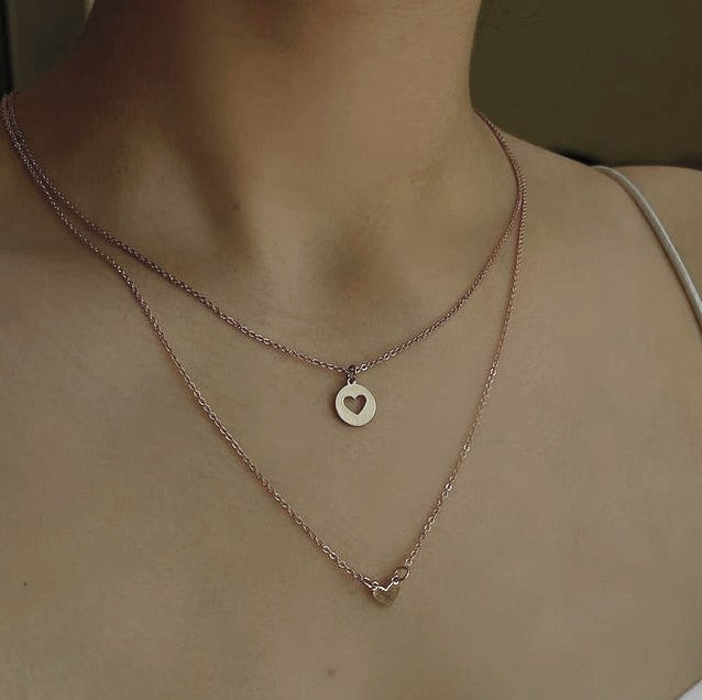 Collar con corazón de mujer