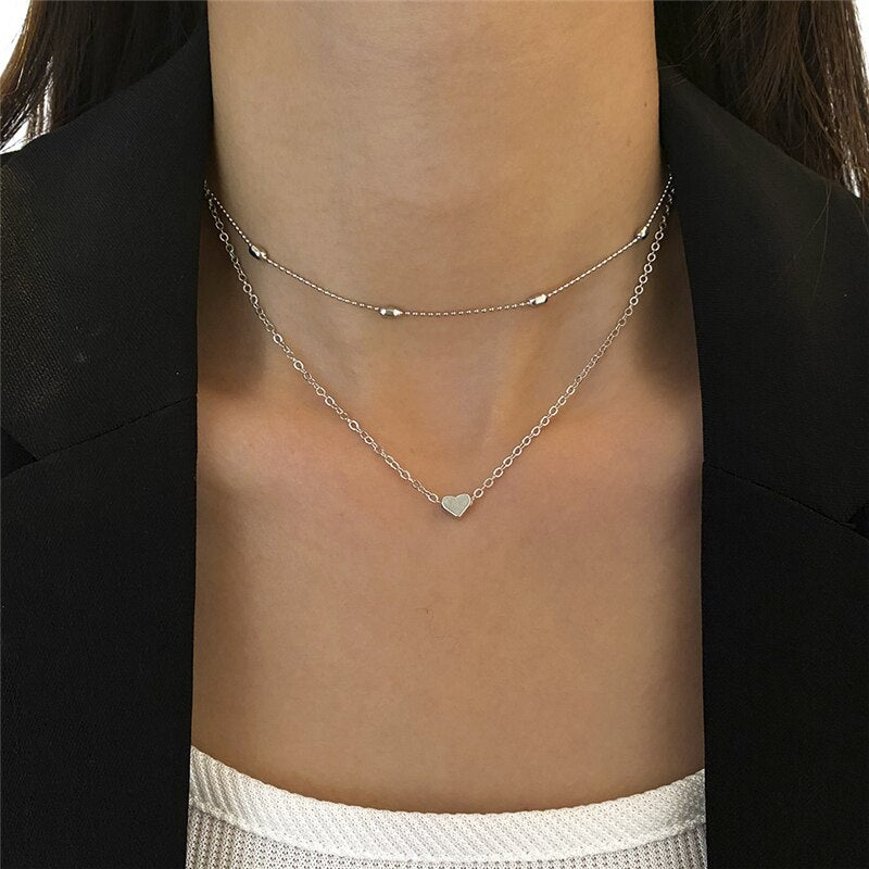 Collar con corazón de mujer